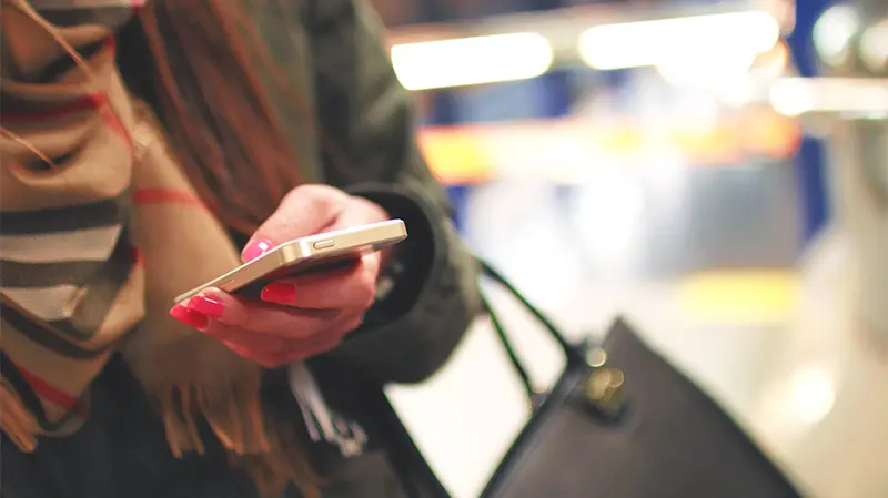 woman checking phone