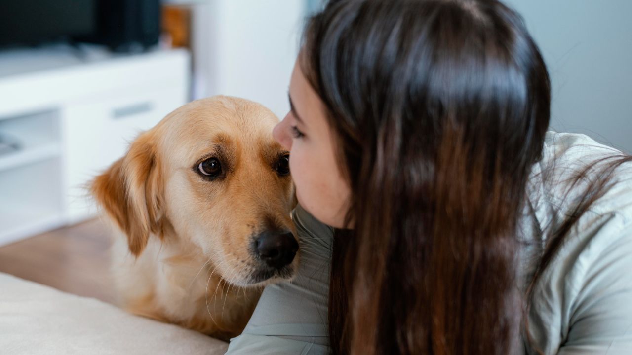 woman getting comfort from her ESA dog